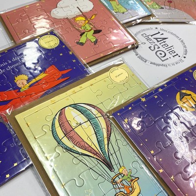 [Carterie] Puzzles  assembler Le Petit Prince en Cartes Postales